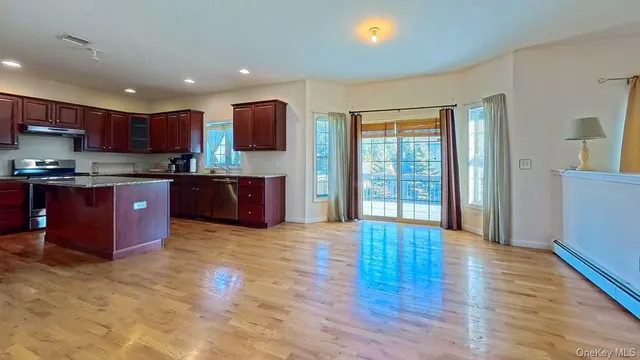 a view of a room that has a large window