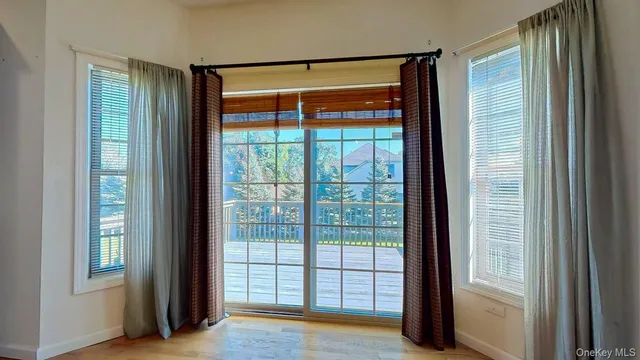 a kitchen with granite countertop kitchen island a sink a counter space and stainless steel appliances