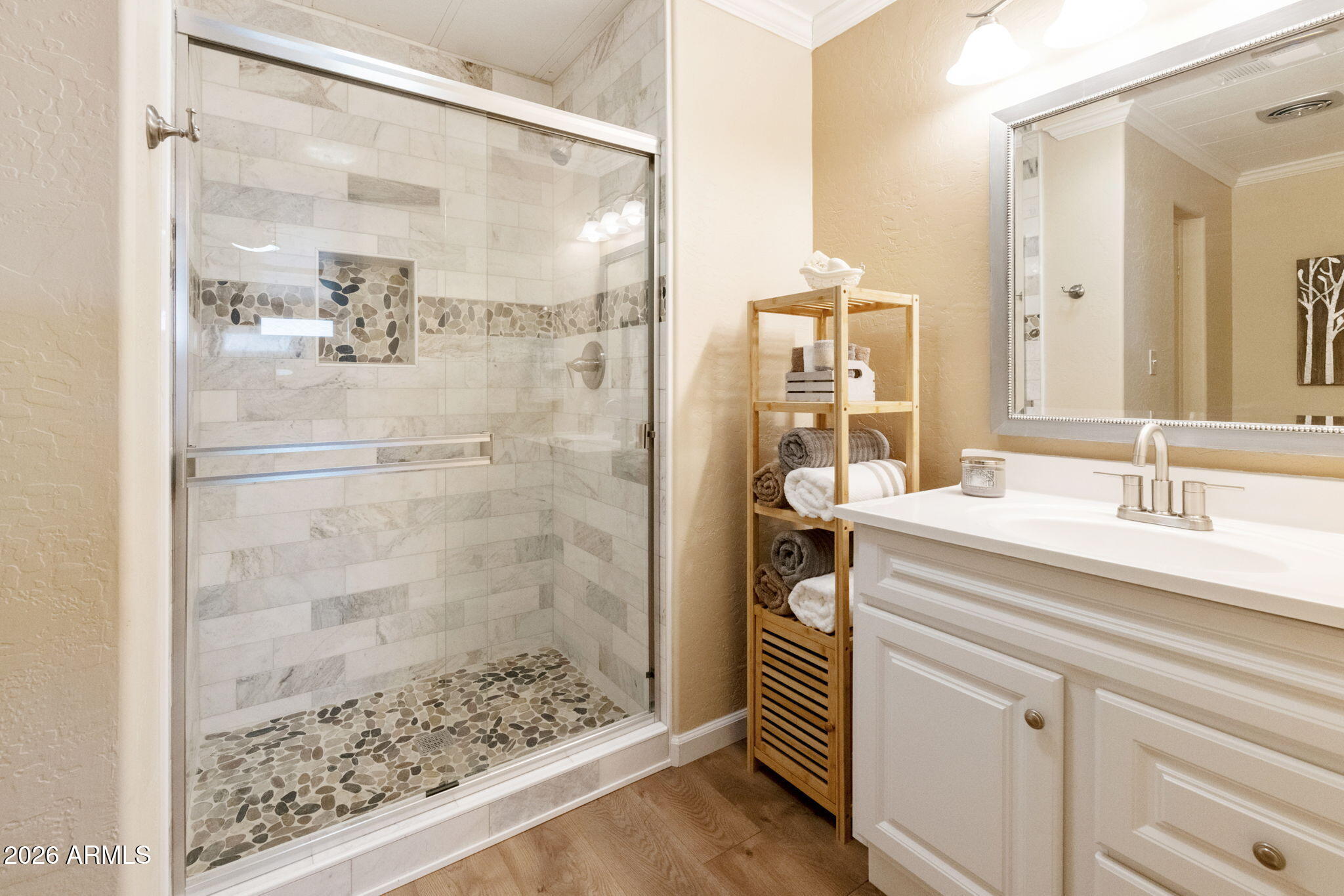 2435 North Higley Road Mesa, AZ 85215 - Photo 19 of 84 a bathroom with a sink and a mirror