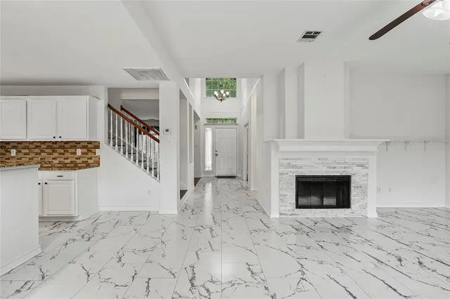 a view of livingroom with furniture and fireplace