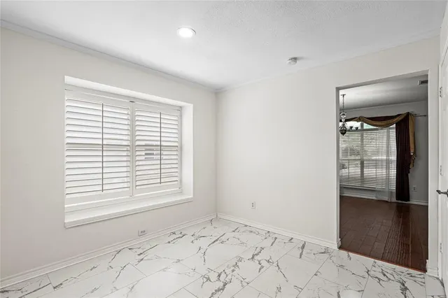 a view of a room that has a window in it