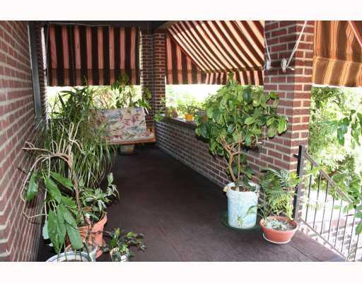 4044 Franklin Road Observatory Hill, PA 15214 - Photo 2 of 16 Patio/Deck. Hide out on the cozy front porch with new striped awnings.