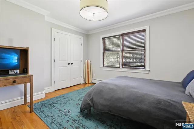 a view of livingroom with furniture window and wooden floor