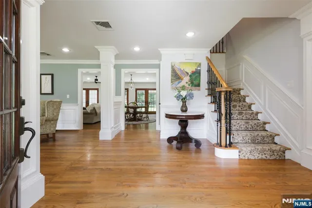 a view of kitchen with dining table and chairs