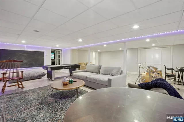 a living room with furniture and a table