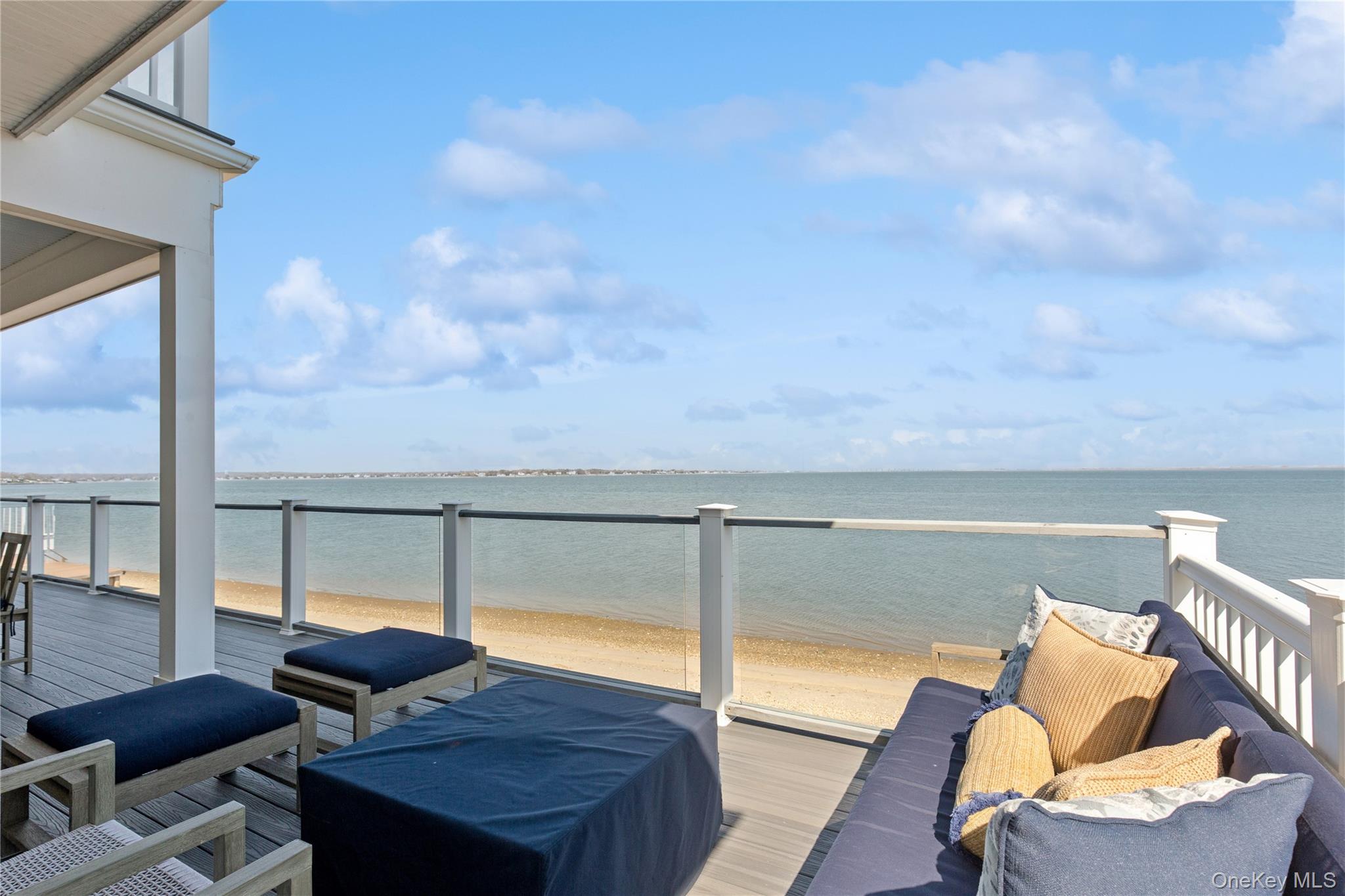 39 Shinnecock Road East Quogue, NY 11942 - Photo 21 of 35 a view of balcony with couch