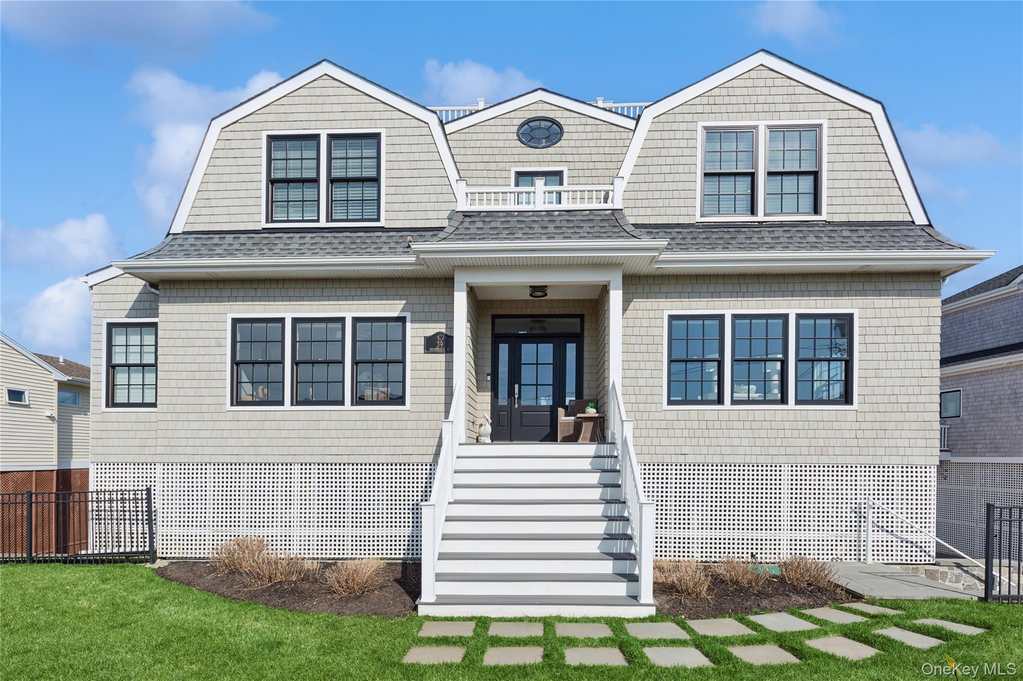 39 Shinnecock Road East Quogue, NY 11942 - Photo 31 of 35 a front view of a house