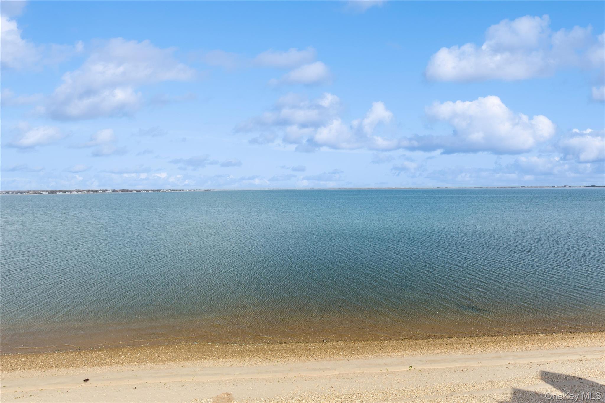 39 Shinnecock Road East Quogue, NY 11942 - Photo 32 of 35 a view of a lake view