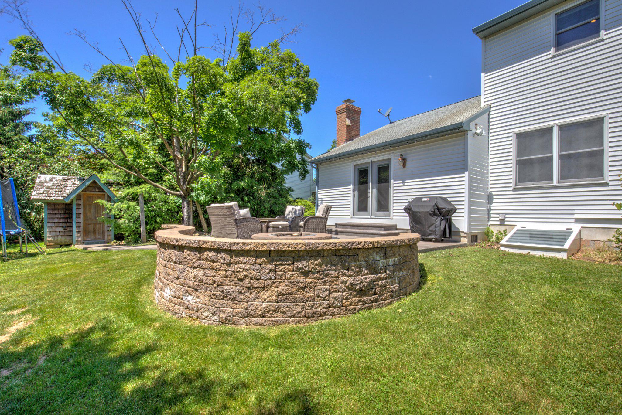 2 Mockingbird Drive Denver, PA 17517 - Photo 8 of 39 Charming backyard retreat with stone wall.