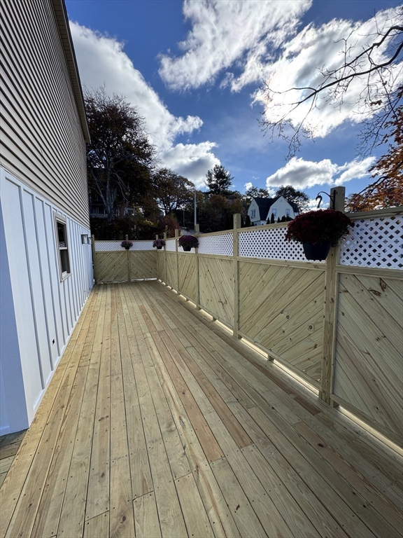 41 Westminster Street Worcester, MA 01605 - Photo 14 of 32 a view of a balcony with wooden floor