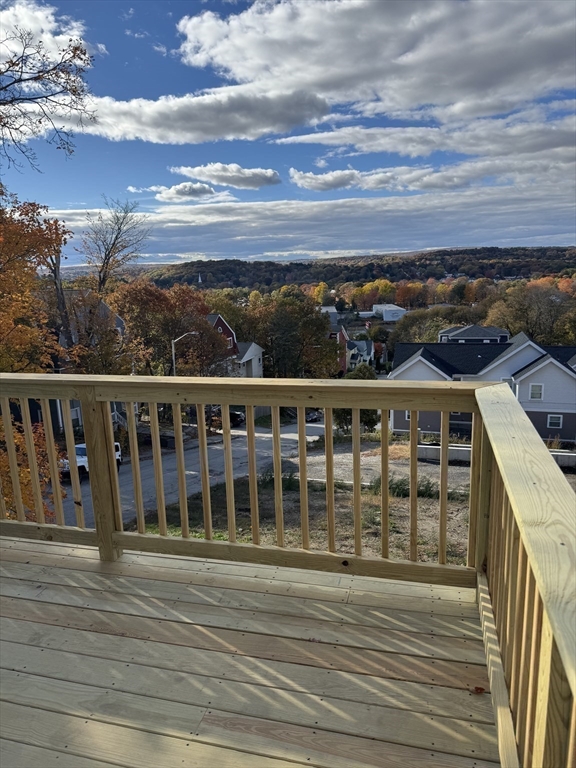 41 Westminster Street Worcester, MA 01605 - Photo 15 of 32 a view of a balcony with wooden floor