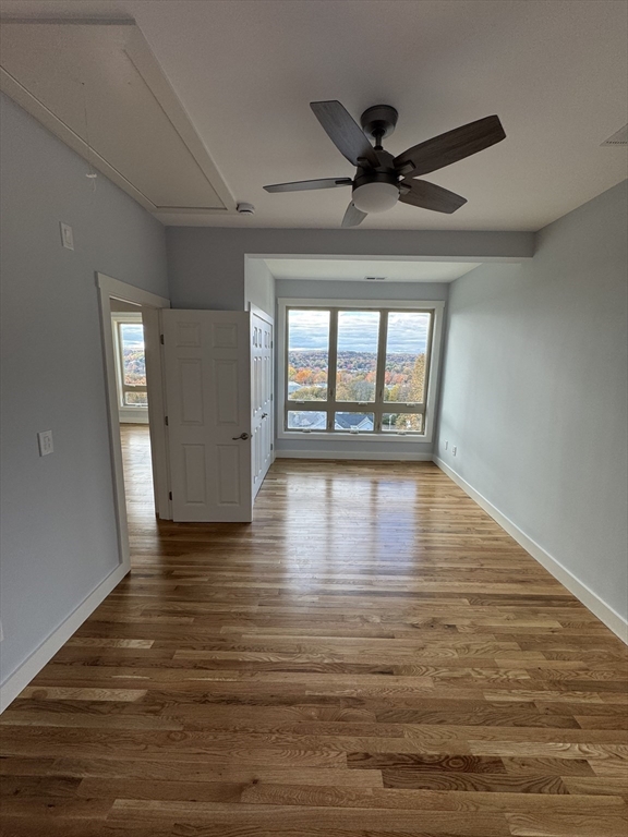 41 Westminster Street Worcester, MA 01605 - Photo 19 of 32 a view of an empty room with wooden floor and a window