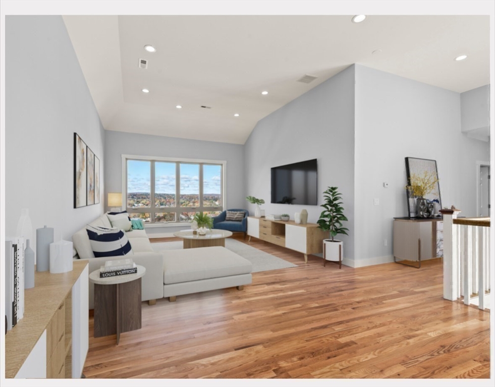 41 Westminster Street Worcester, MA 01605 - Photo 25 of 32 a living room with furniture and a flat screen tv