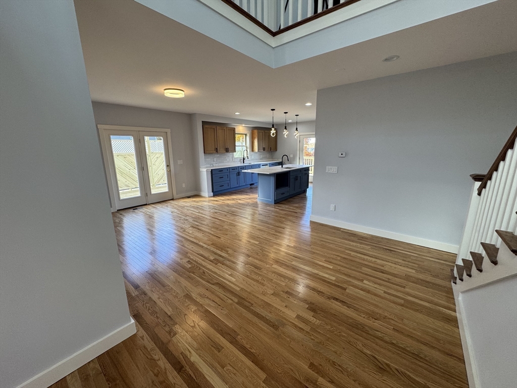 41 Westminster Street Worcester, MA 01605 - Photo 4 of 32 a view of kitchen and hall with wooden floor