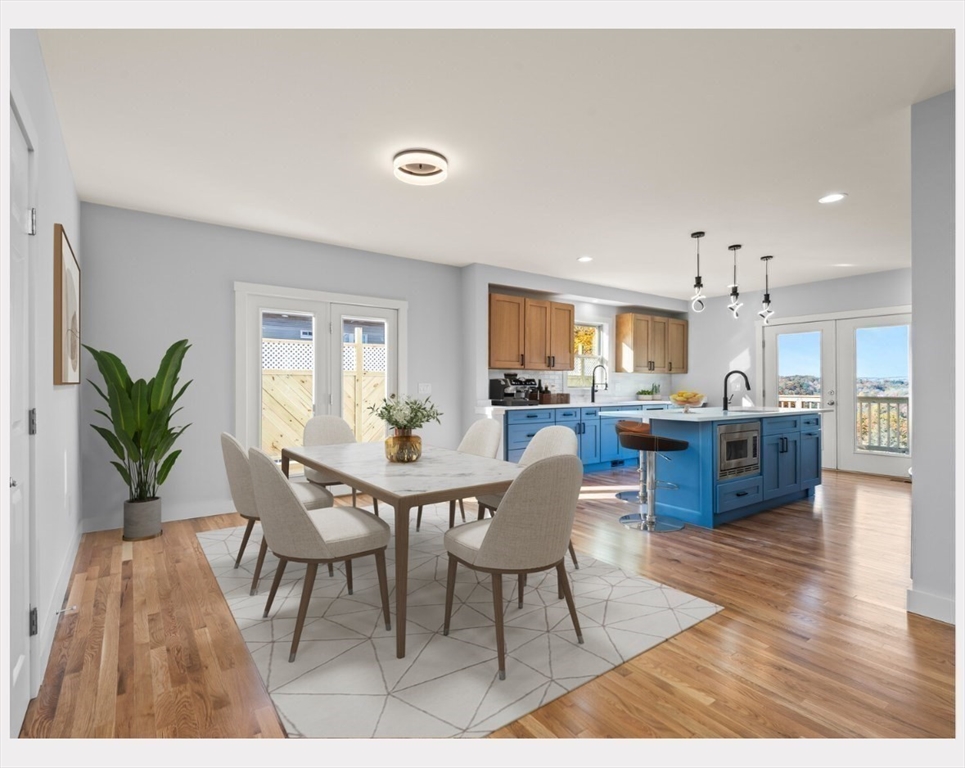 41 Westminster Street Worcester, MA 01605 - Photo 5 of 32 a view of a dining room with furniture and wooden floor