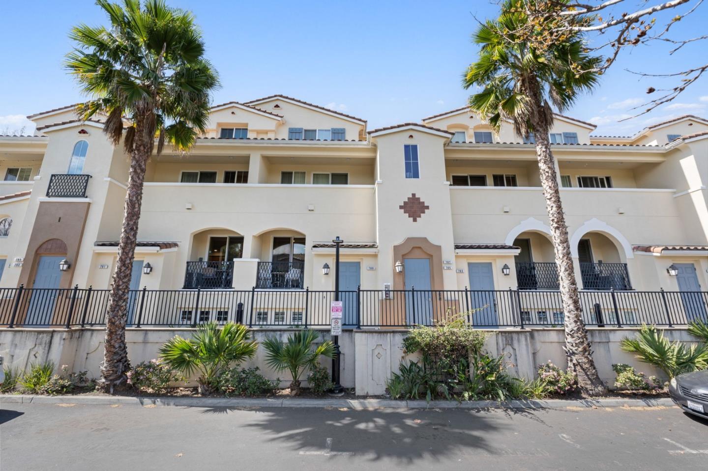 a front view of a building with garden