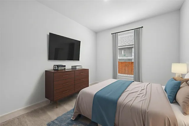 a kitchen with a sink chandelier and wooden floor