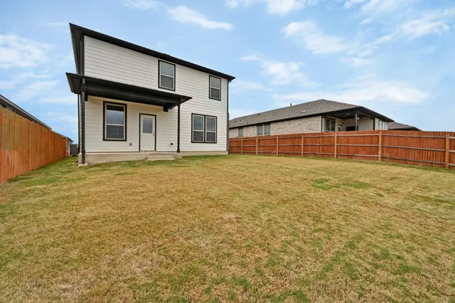 a view of a terrace with furniture