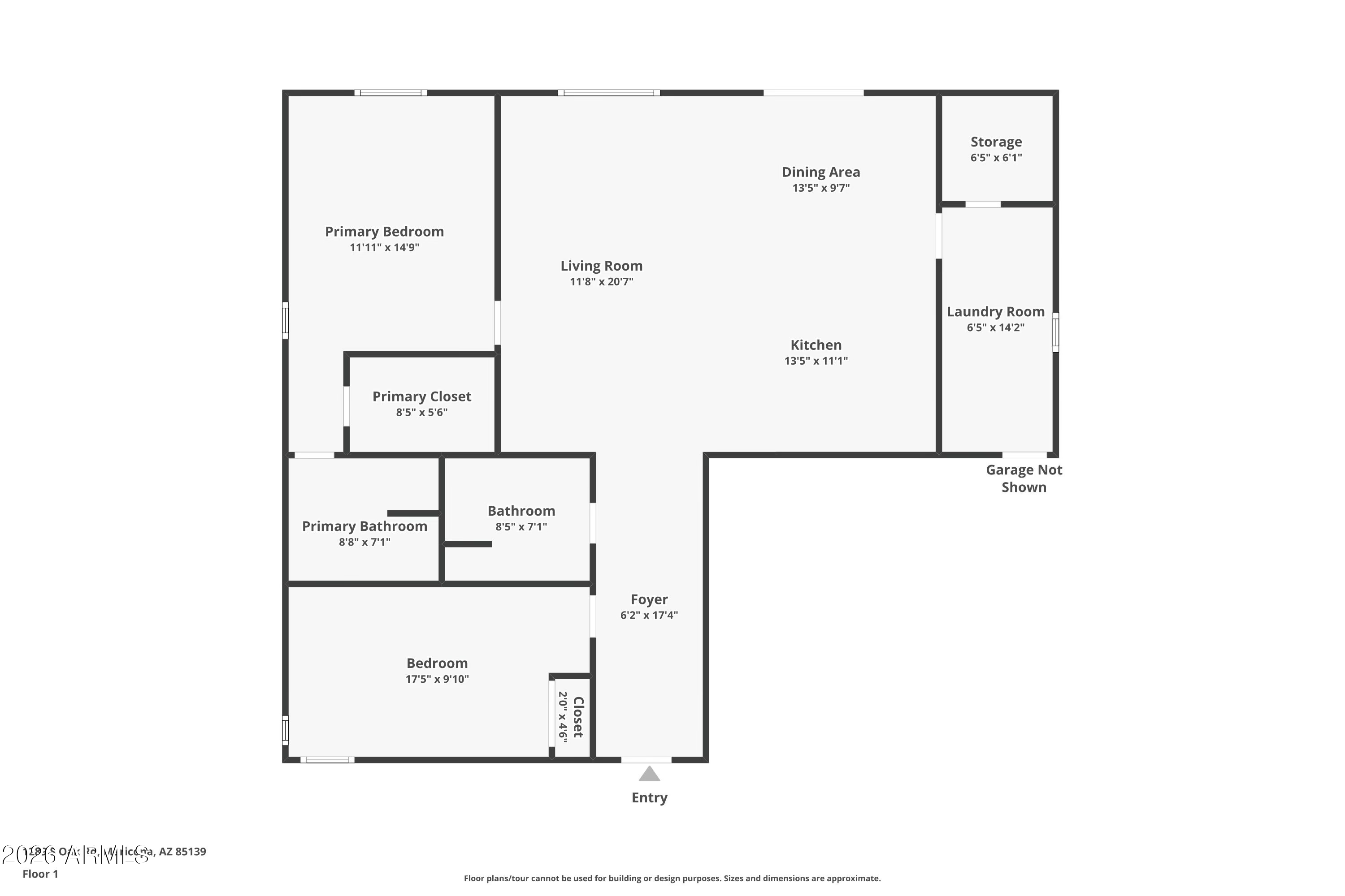 1289 South Oak Road Maricopa, AZ 85139 - Photo 39 of 39 a picture of a room with a white wall and a refrigerator