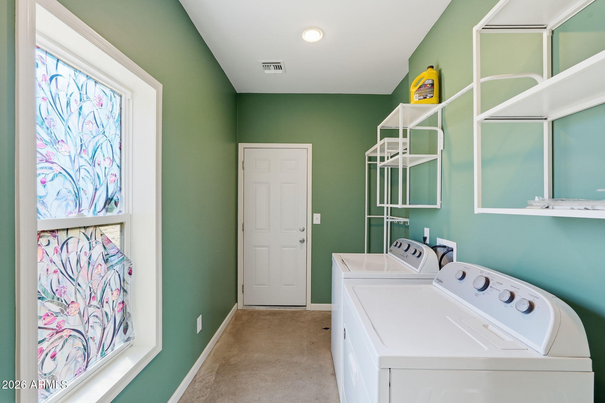 1289 South Oak Road Maricopa, AZ 85139 - Photo 27 of 39 a bathroom with a sink and mirror with bathtub