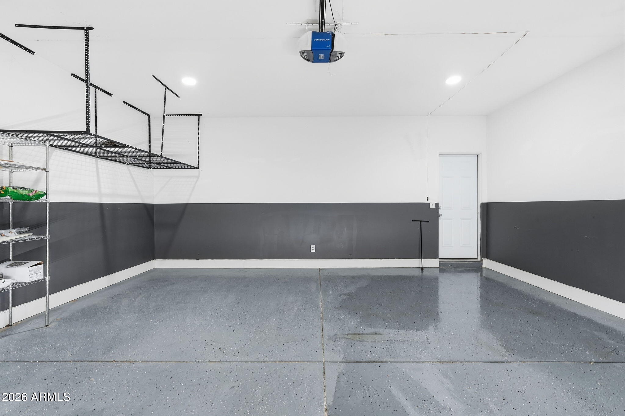 1289 South Oak Road Maricopa, AZ 85139 - Photo 28 of 39 a view of a kitchen with furniture and wooden floor