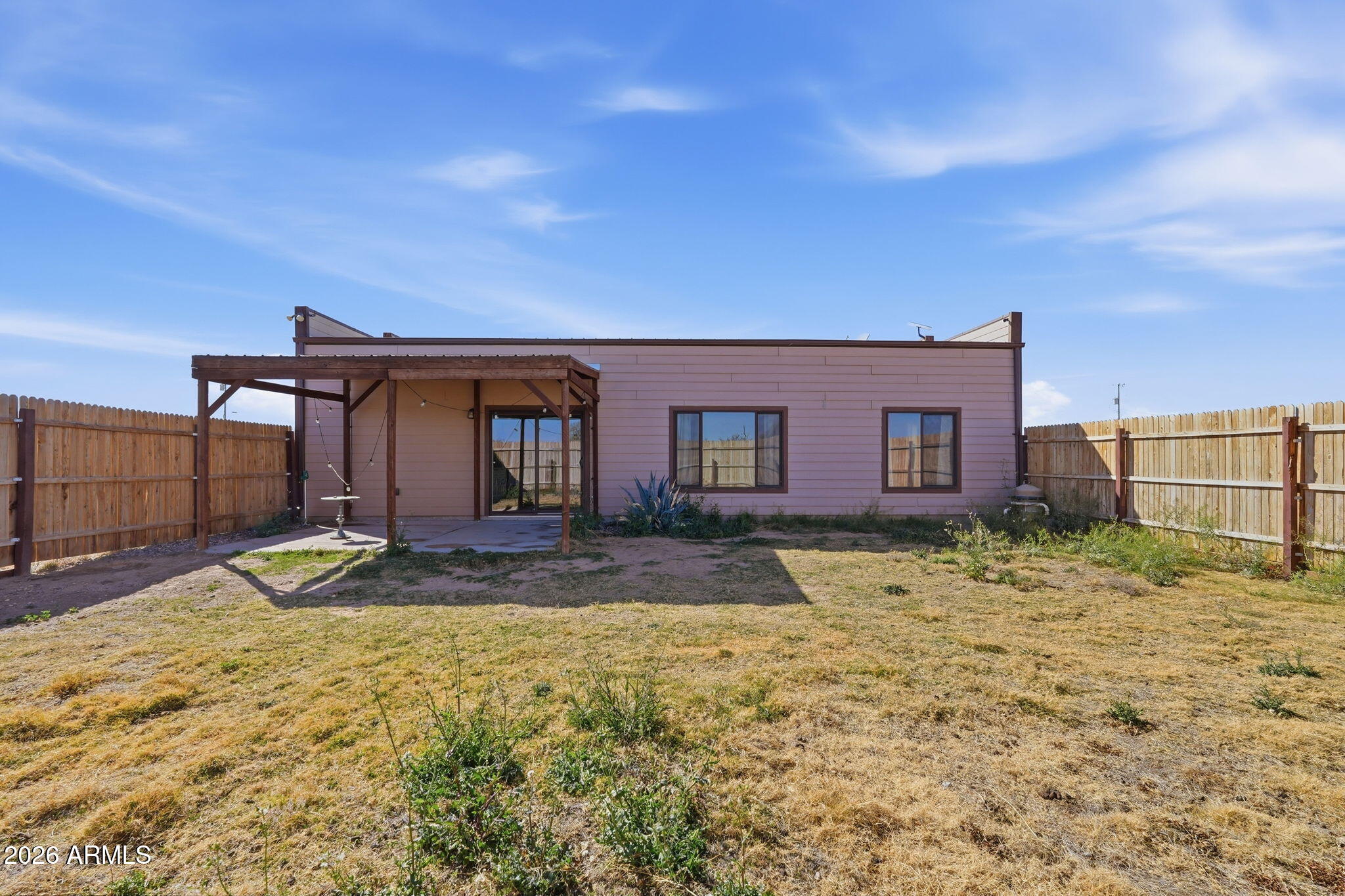 1289 South Oak Road Maricopa, AZ 85139 - Photo 31 of 39 a view of a house with backyard
