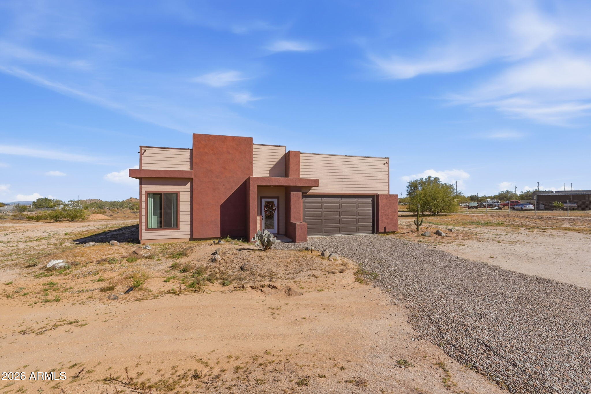 1289 South Oak Road Maricopa, AZ 85139 - Photo 4 of 39 a view of a house with a yard