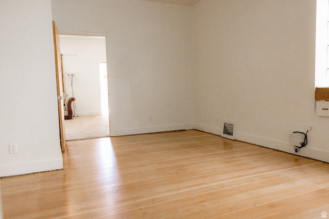 69 South Main Street Manti, UT 84642 - Photo 39 of 44 Light wood-finish flooring with white baseboards and neutral wall tones