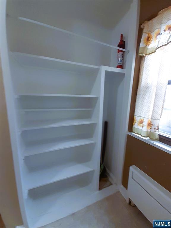 3071 Edwin Avenue, Unit 5G Fort Lee, NJ 07024 - Photo 15 of 21 a view of walk in closet with empty racks