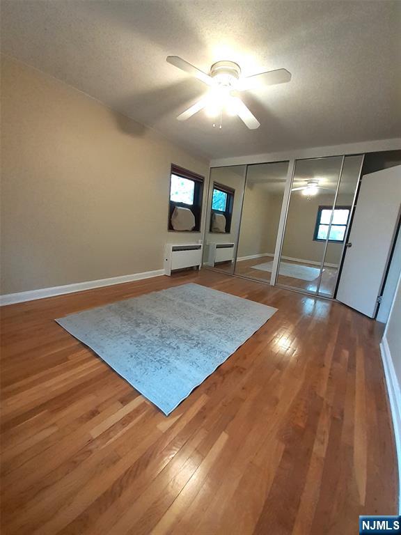 3071 Edwin Avenue, Unit 5G Fort Lee, NJ 07024 - Photo 21 of 21 a view of a room with wooden floor