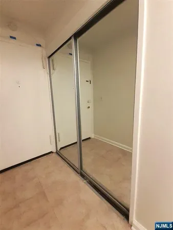 a kitchen with sink cabinets and refrigerator