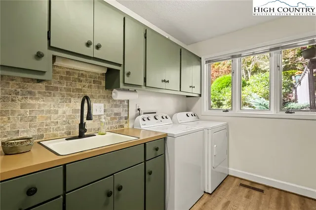 a bedroom with a bed and dresser