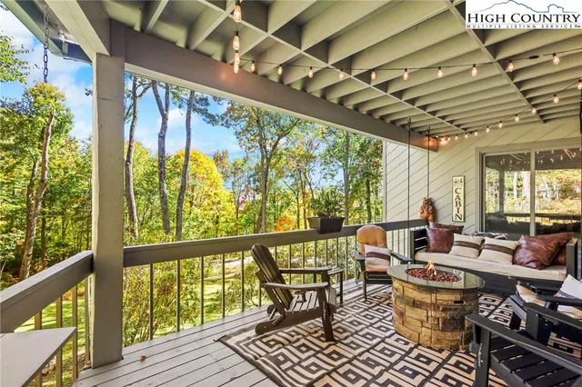 a view of a porch and a trees