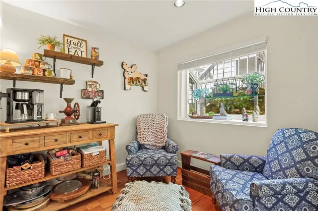 a kitchen with stainless steel appliances a refrigerator and a stove top oven