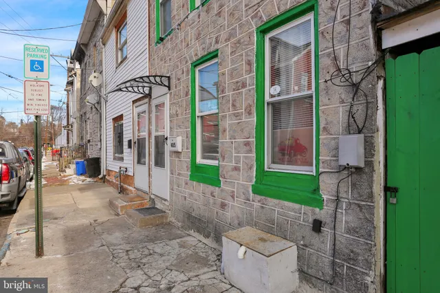 a view of a brick buildings with many windows