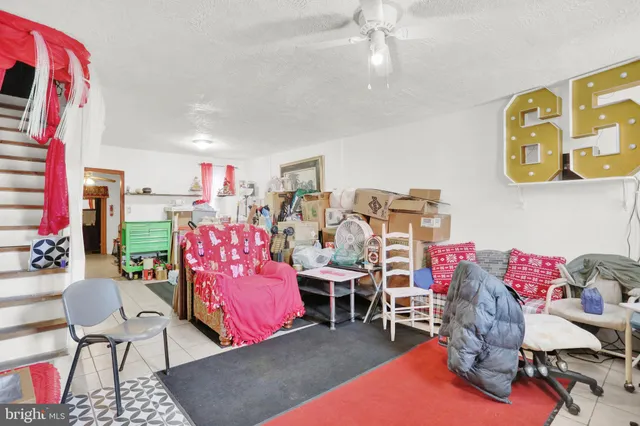 a living room with furniture and a couch