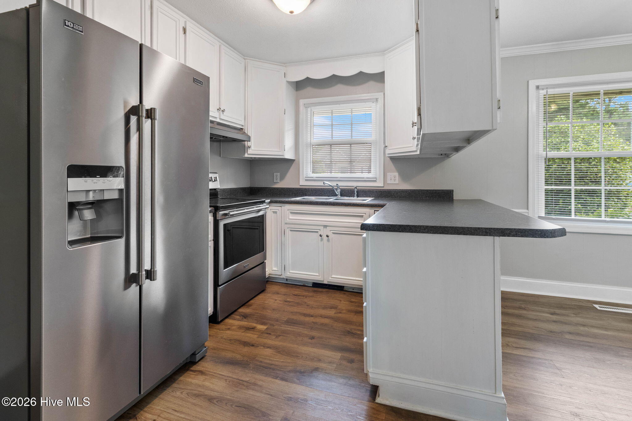 614 Wedgewood Road Whiteville, NC 28472 - Photo 8 of 34 With Peninsula Bar Seating
