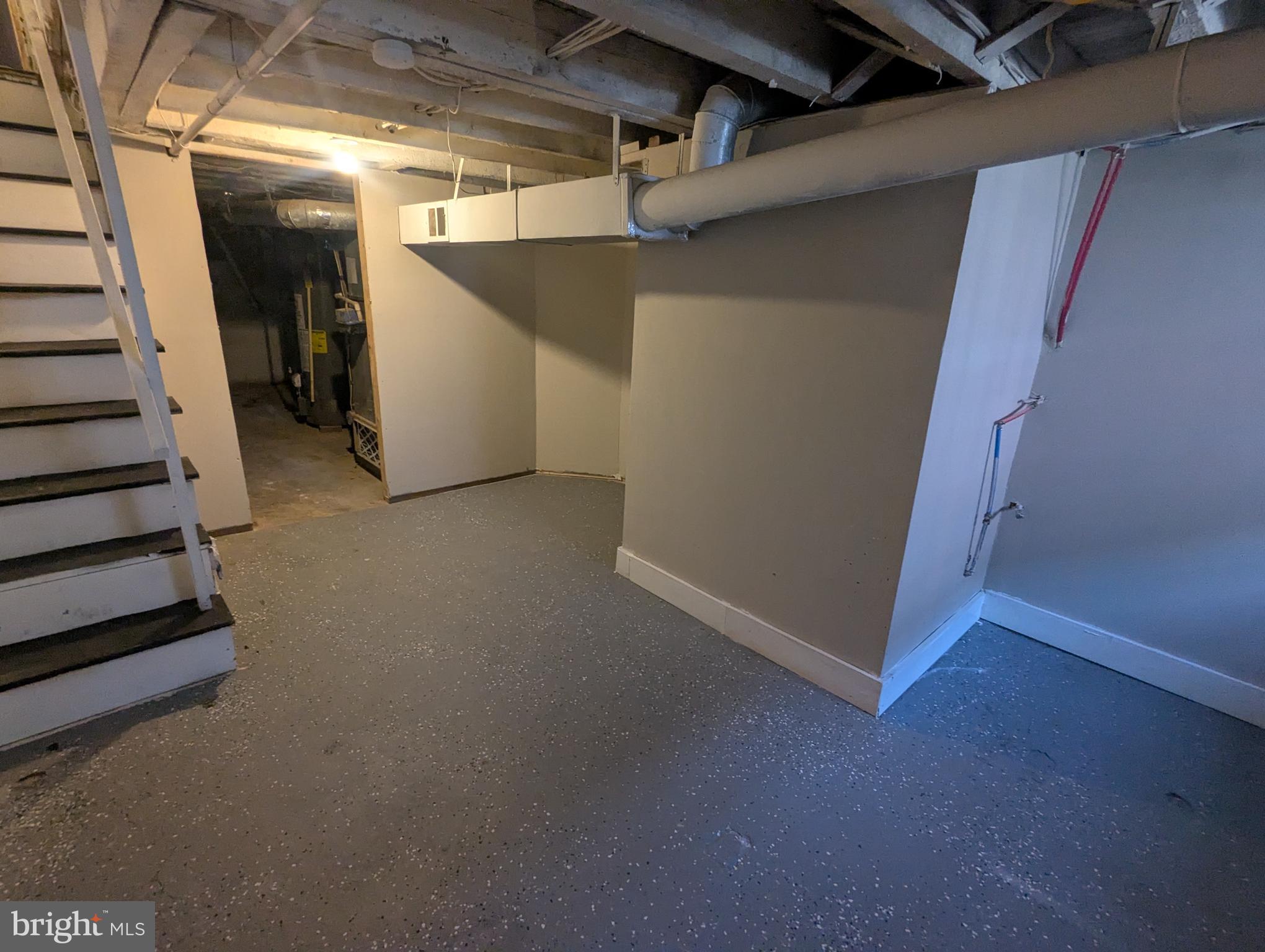 2747 North Judson Street Philadelphia, PA 19132 - Photo 17 of 18 a view of a room with stairs