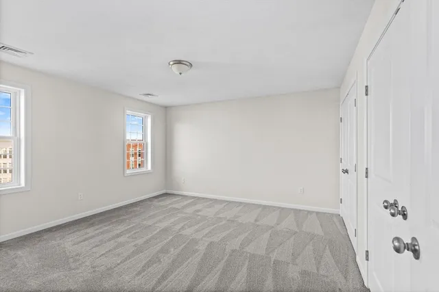 a bathroom with a bathtub a sink a vanity and the view