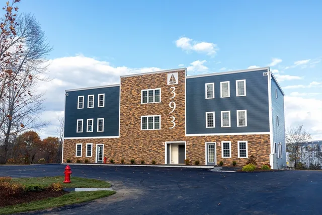 a view of a balcony with wooden floor