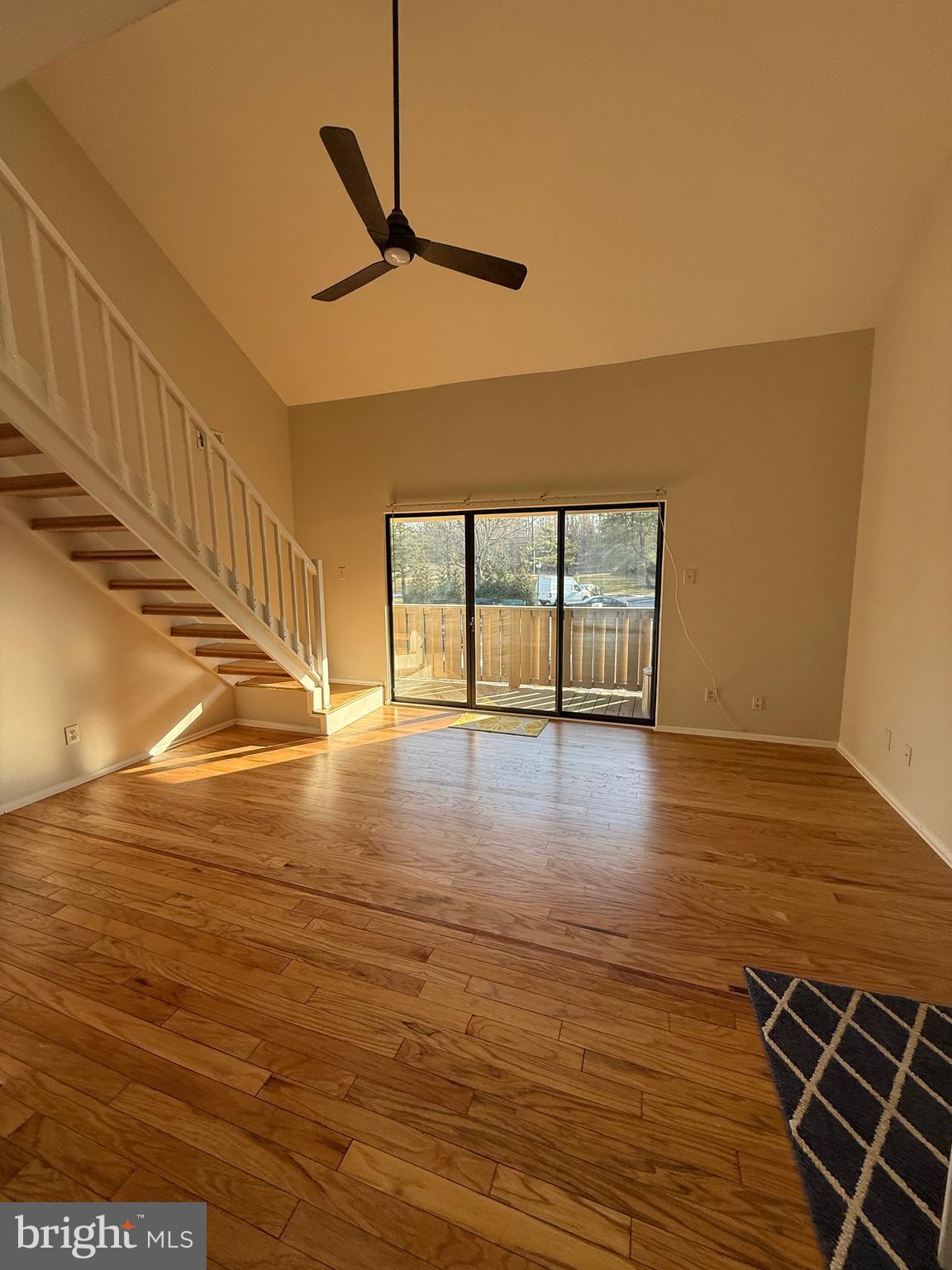 1902 The Woods Cherry Hill, NJ 08003 - Photo 3 of 17 a view of an empty room with wooden floor and a window