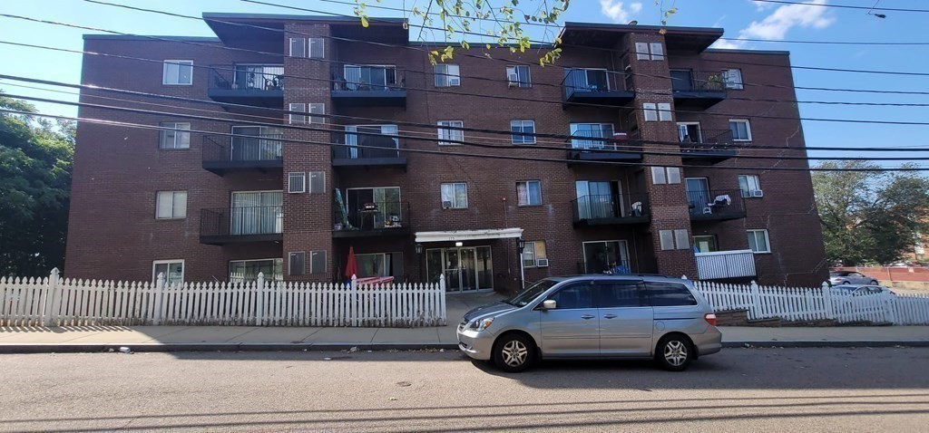 a car parked in front of a building