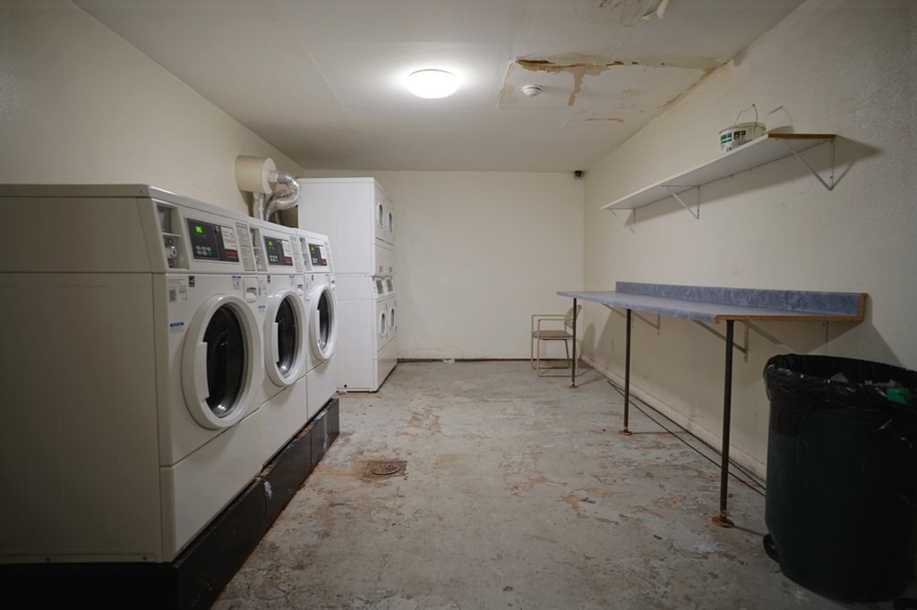 175 Clare Avenue, Unit E8 Boston, MA 02136 - Photo 20 of 25 a utility room with dryer and washer
