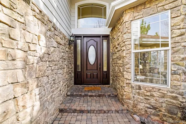 a front view of a house with a outdoor space