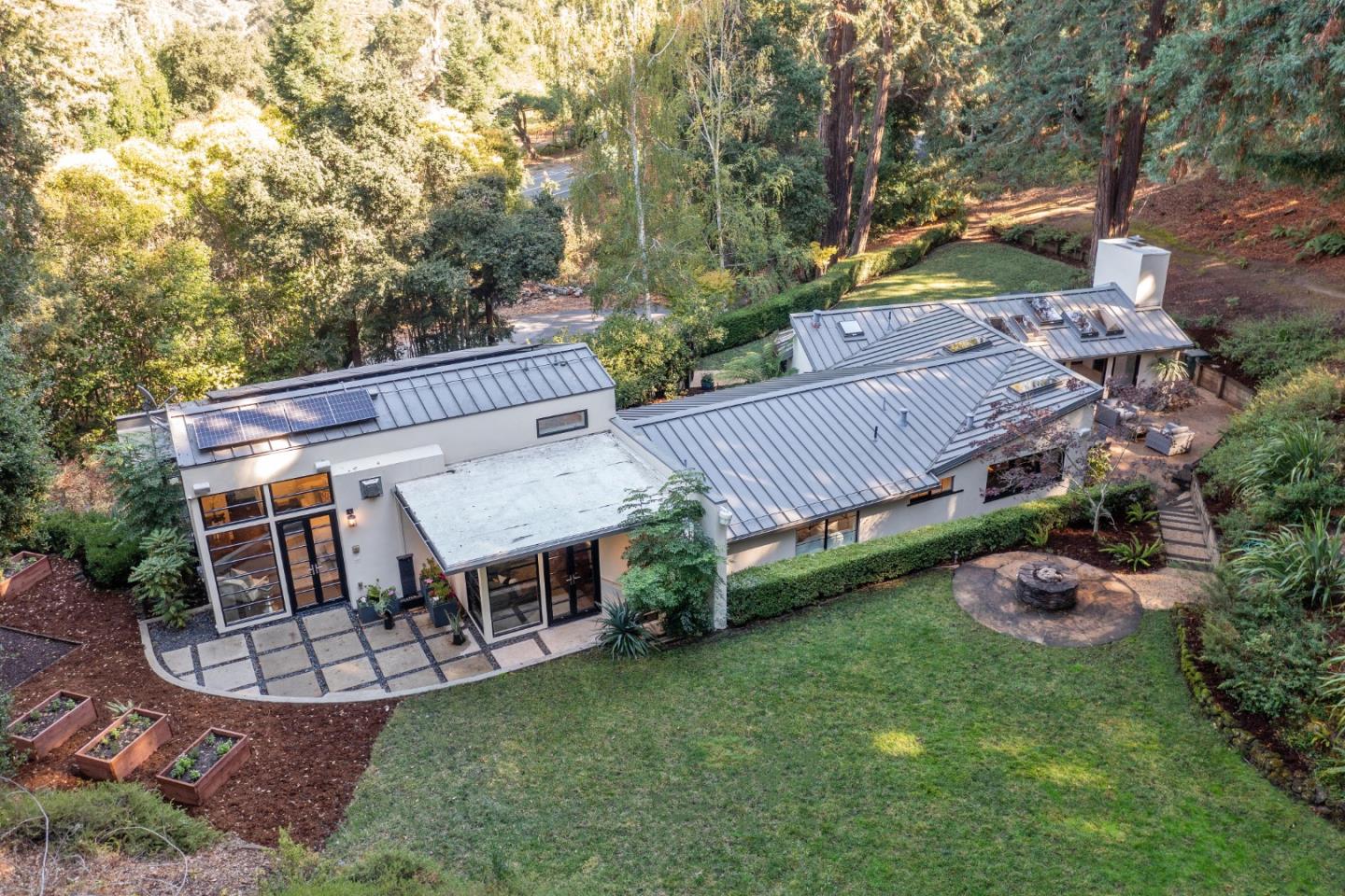 1307 Portola Road Woodside, CA 94062 - Photo 1 of 1 an aerial view of a house having patio with a yard