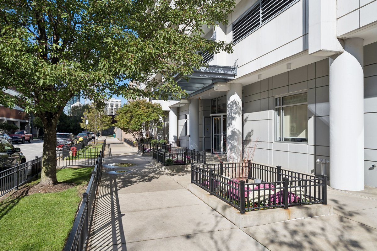 1629 South Prairie Avenue, Unit 801 Chicago, IL 60616 - Photo 2 of 33 a view of a house with a yard and sitting area