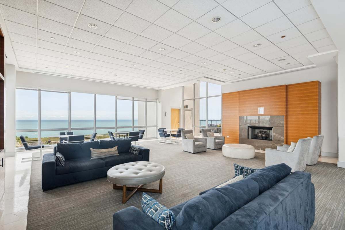 1629 South Prairie Avenue, Unit 801 Chicago, IL 60616 - Photo 24 of 33 a living room with furniture and a large window