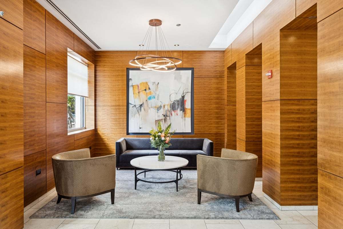 1629 South Prairie Avenue, Unit 801 Chicago, IL 60616 - Photo 3 of 33 a living room with furniture and a chandelier