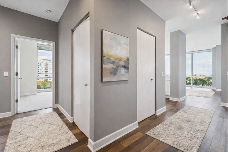 1629 South Prairie Avenue, Unit 801 Chicago, IL 60616 - Photo 4 of 33 a view of a hallway to rooms and wooden floor