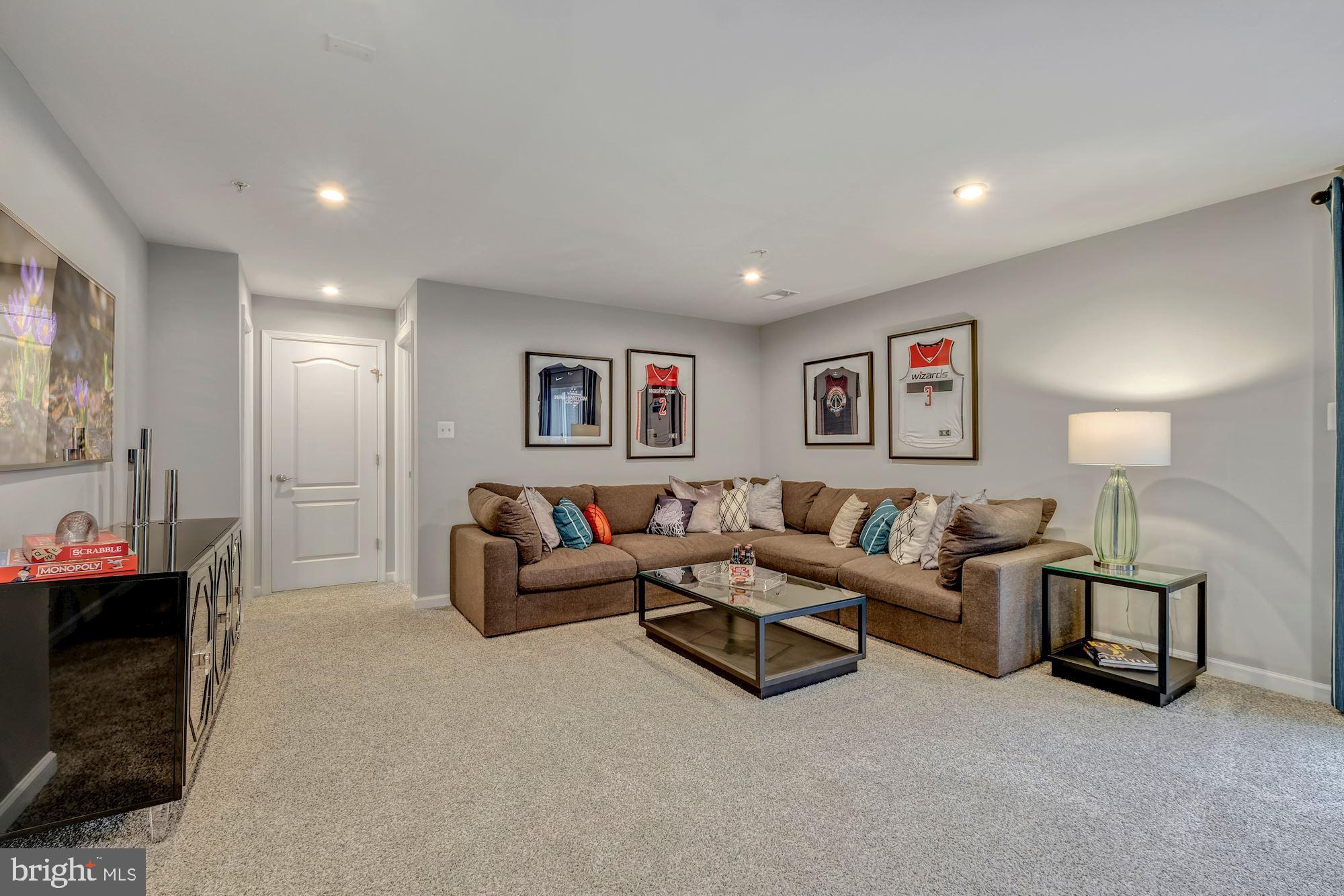 4004 Millner Road Nottingham, MD 21236 - Photo 26 of 34 a living room with furniture and a flat screen tv